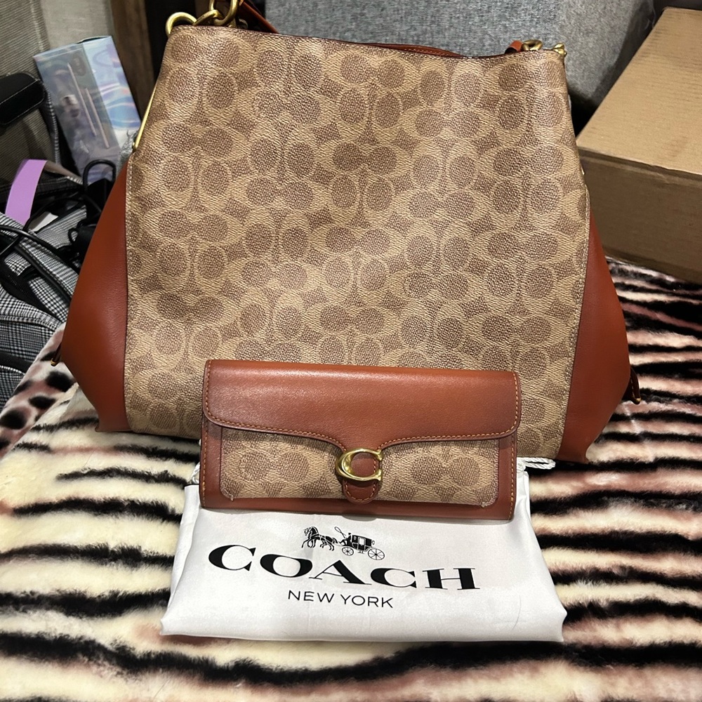 Coach Dalton 31 in Rust/Brass with matching wallet.